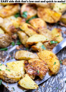 Pinterest pin with a spatula on a sheet pan of garlic parmesan roasted potatoes.