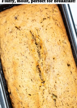 Pinterest pin with a loaf of banana bread in a bread pan on a table.