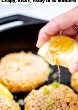 Pinterest pin for gluten free crab cakes with a photo of lemon juice being squeezed on a crab cake.