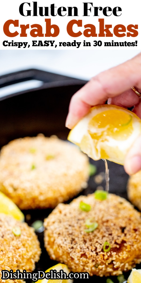 Pinterest pin for gluten free crab cakes with a photo of lemon juice being squeezed on a crab cake.