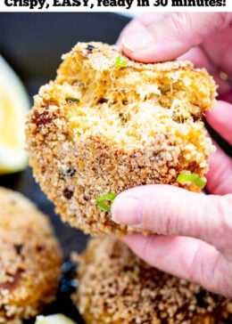 Pinterest pin with a photo of gluten free crab cake being broken in half by hands.