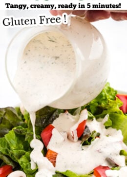 Pinterest pin for buttermilk ranch dressing with a small pitcher pouring dressing onto a bowl of salad.