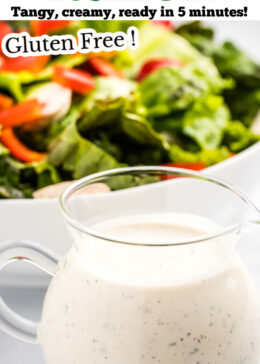 Pinterest pin with a small pitcher of buttermilk ranch dressing in front of a bowl of salad.