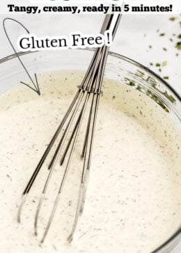 Pinterest pin with a bowl of ranch dressing with a whisk in it.