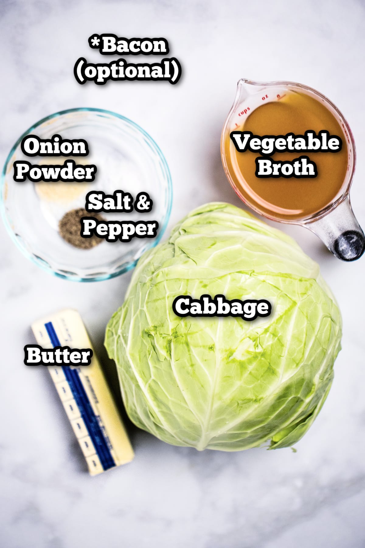 Individual ingredients needed to make instant pot cabbage on a table.