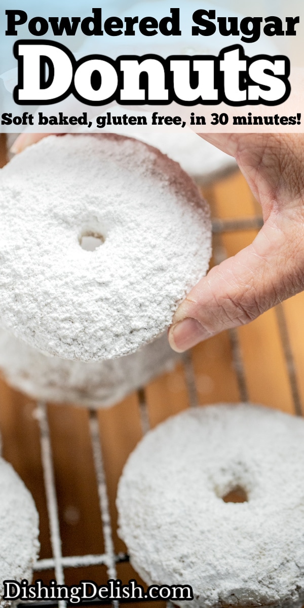 Pinterest pin with a hand holding a powdered sugar donut.