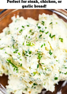 Pinterest pin with roasted garlic herb butter in a clear glass bowl.