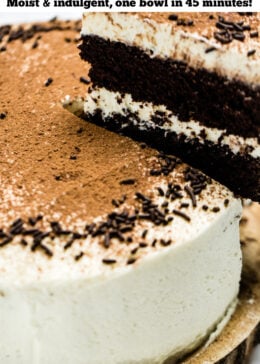 Pinterest pin of chocolate coffee cake with mascarpone frosting decorated on top with chocolate sprinkles and dusted with cocoa powder. A piece of cake is being lifted up.