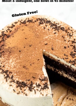 Pinterest pin of chocolate coffee cake with mascarpone frosting decorated on top with chocolate sprinkles and dusted with cocoa powder. A piece of cake is being lifted up.