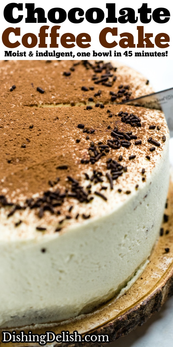 Pinterest pin of chocolate coffee cake with mascarpone frosting decorated on top with chocolate sprinkles and dusted with cocoa powder. A knife is cutting into the cake.