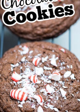 A pinterest pin of a chocolate cookie with crushed peppermint candies on top.