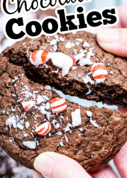 A pinterest pin with two hands breaking a peppermint chocolate cookie in half.