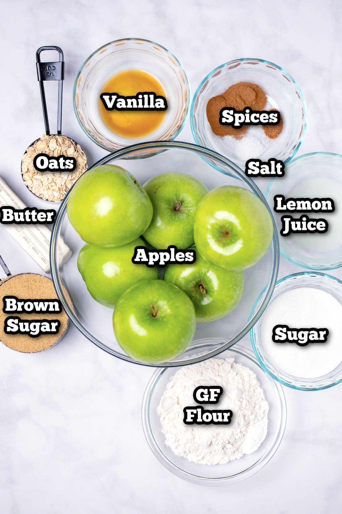 Individual ingredients for crockpot apple crisp on a table.