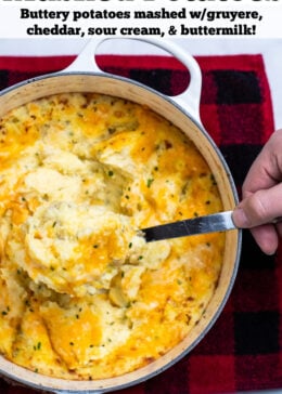 Pinterest pin with a spoon scooping cheesy mashed potatoes, with melty cheese pulling from the dish.