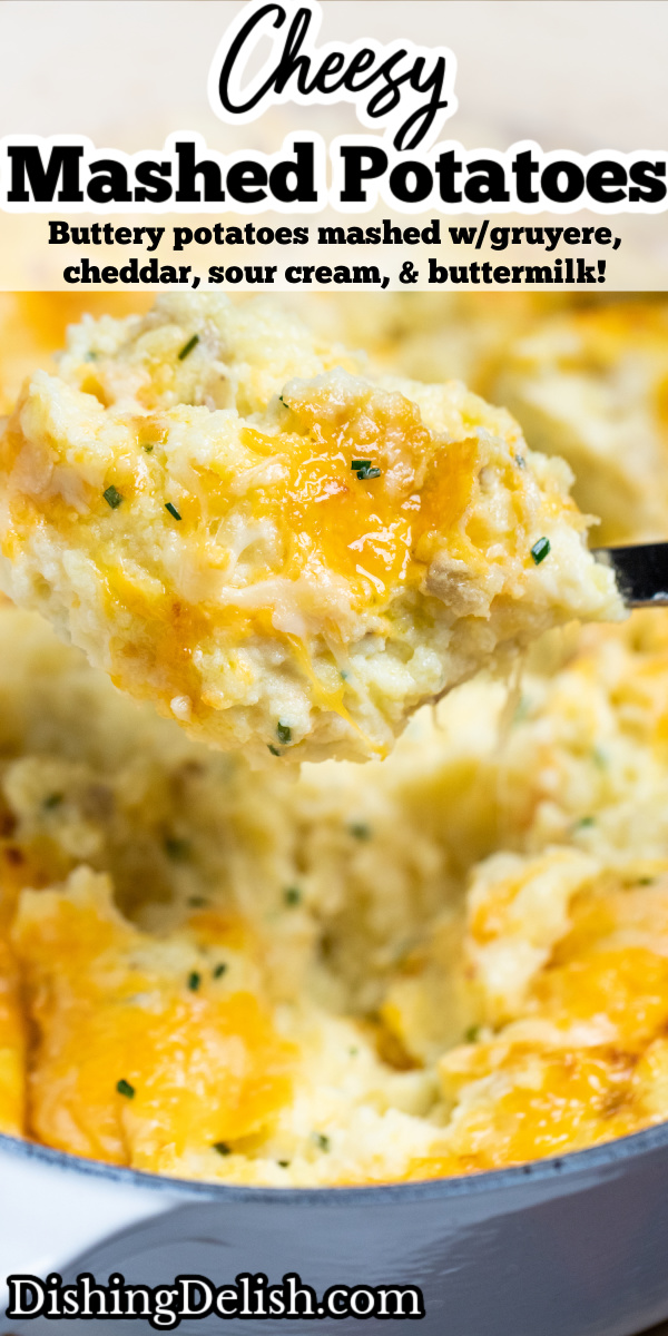 Pinterest pin with a spoon scooping cheesy mashed potatoes, with melty cheese pulling from the dish.