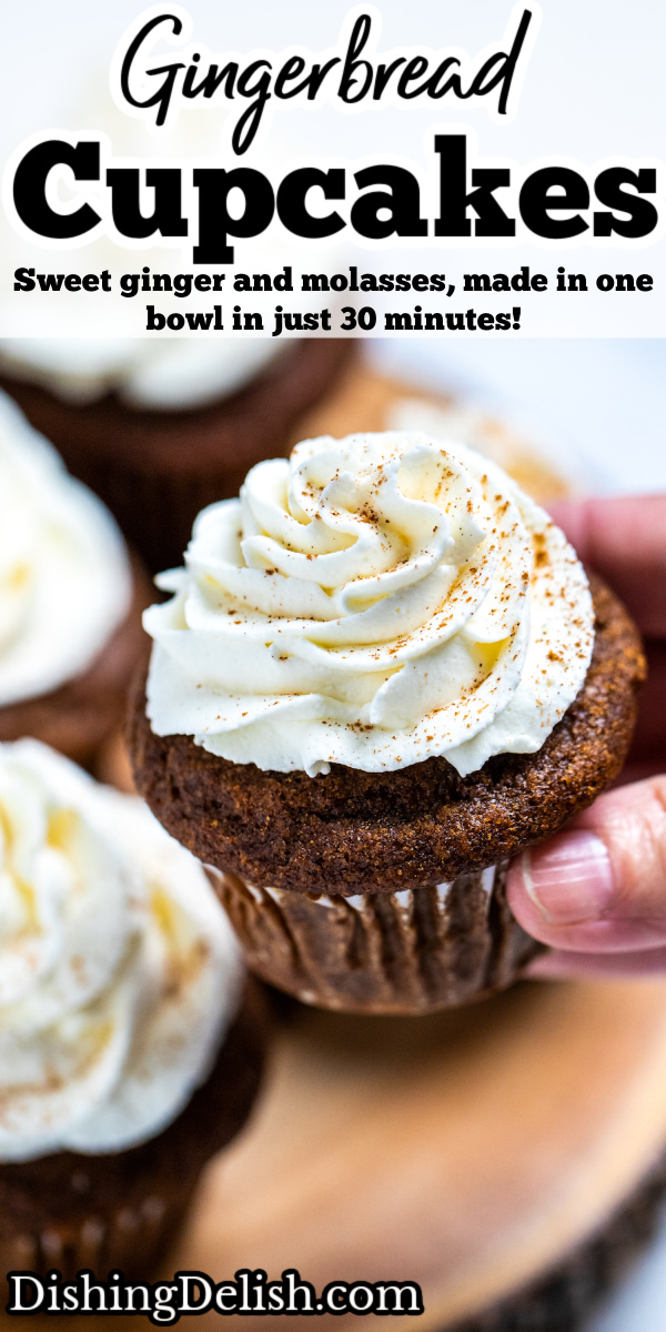 Pinterest pin with a hand holding a gingerbread cupcake topped with frosting above a wooden cutting board and other cupcakes.