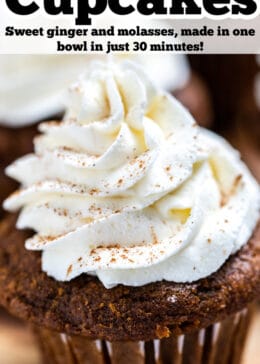 Pinterest pin with a gingerbread cupcake topped with frosting on a wooden cutting board.