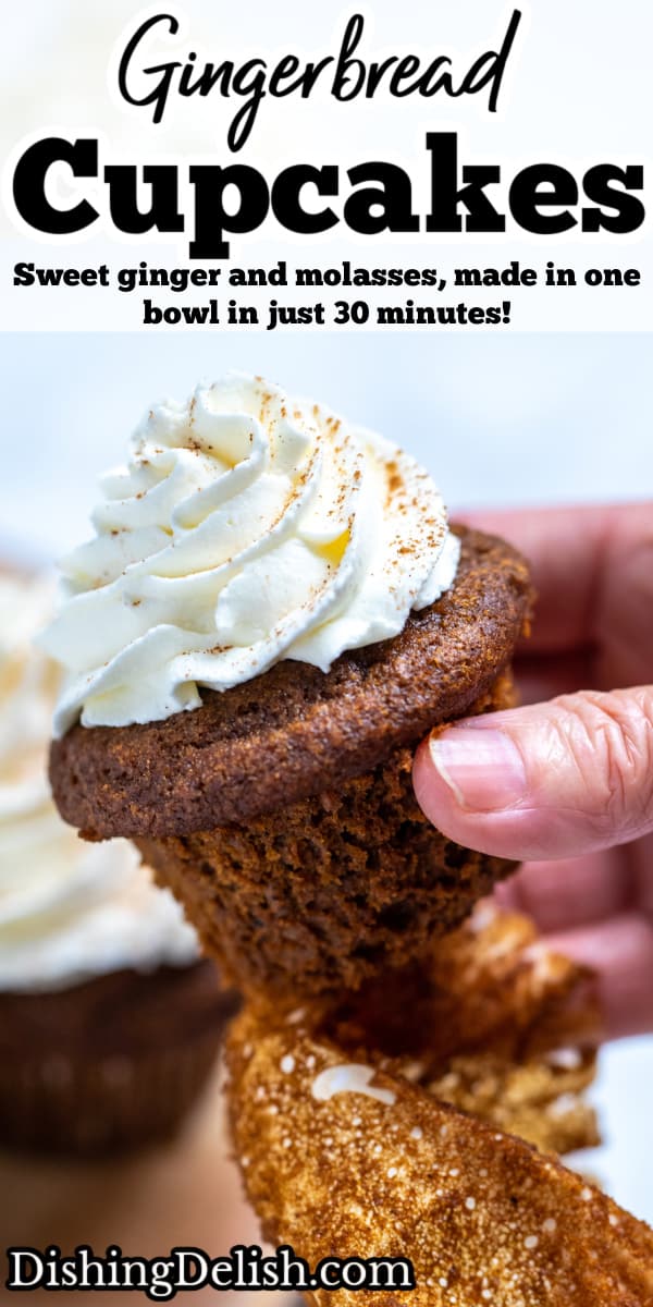 Pinterest pin with a hand holding a gingerbread cupcake topped with frosting above a wooden cutting board and other cupcakes.