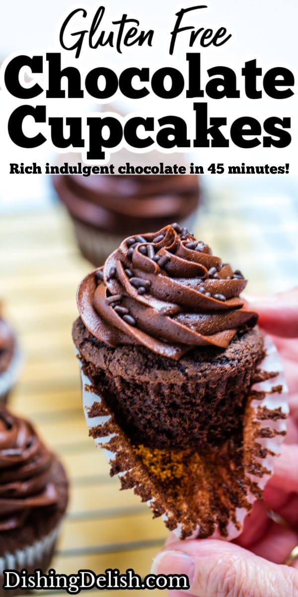 Pinterest pin with a hand removing the paper liner from a gluten free chocolate cupcake topped with buttercream.