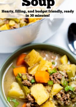 Pinterest pin with a bowl of ground beef soup in front of a dutch oven.