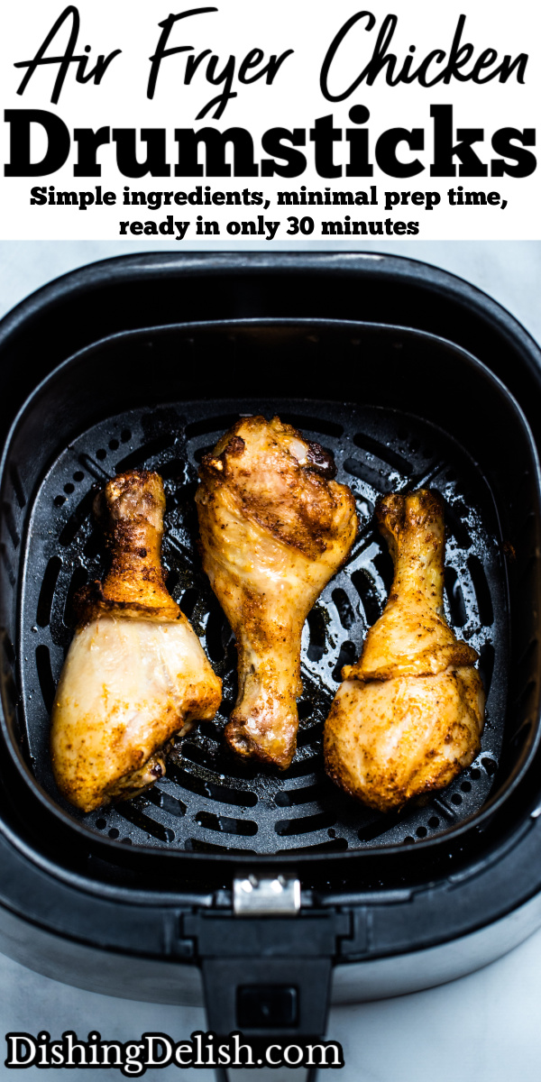 Pinterest pin with three chicken drumsticks in an air fryer.
