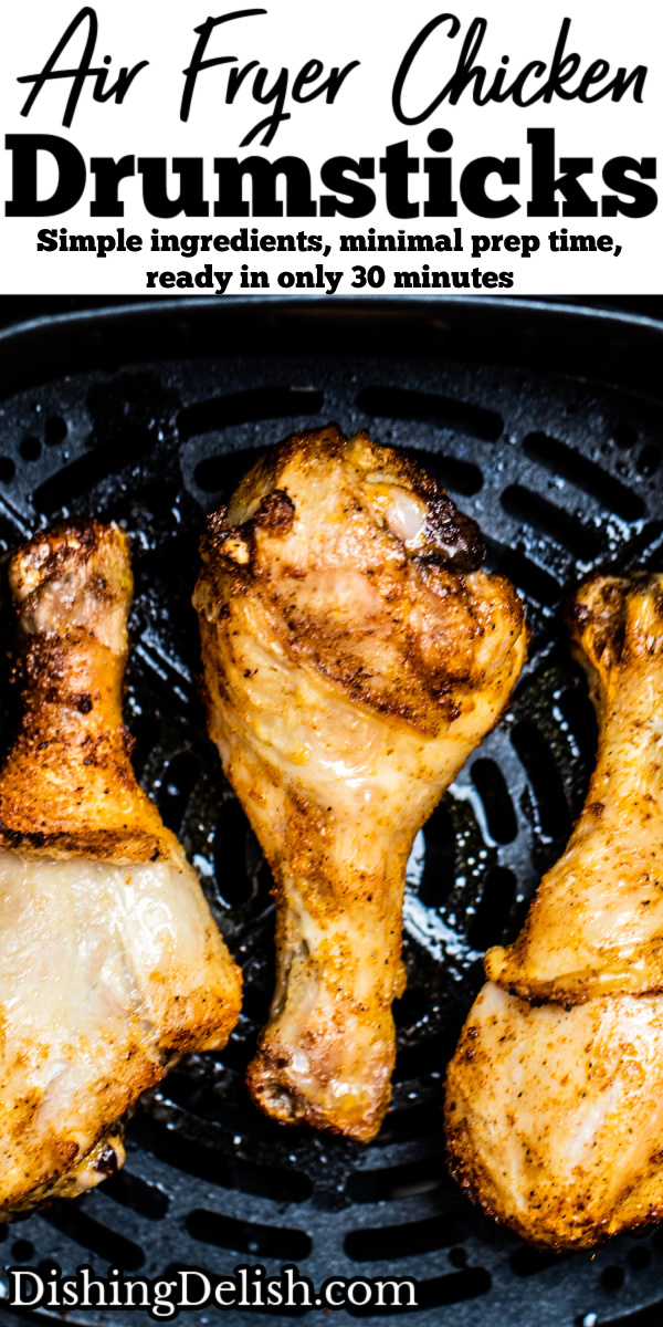 Pinterest pin with three chicken drumsticks in an air fryer.