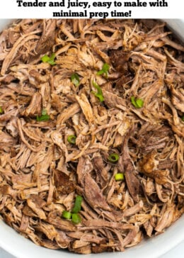 Pinterest pin with shredded pork shoulder in a bowl on a table.