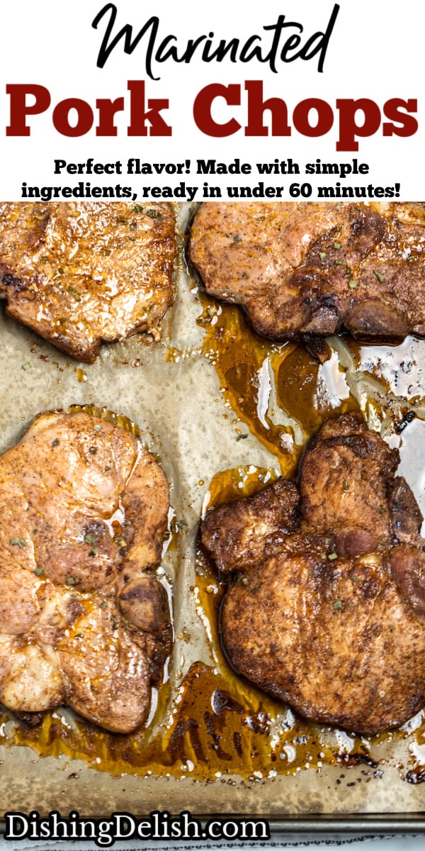 A pinterest pin with a sheet pan of cooked marinated pork chops on parchment paper.
