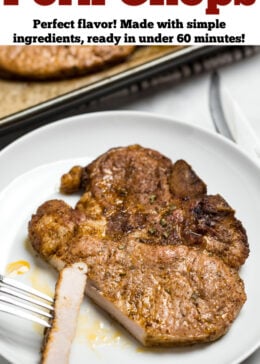 A pinterest pin with marinated pork chop on a plate with a fork holding a slice of chop, next to a sheet pan with other cooked pork chops.