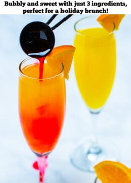 Pinterest pin with a hand holding a tablespoon pouring grenadine into a mimosa next to a small bowl of orange slices.