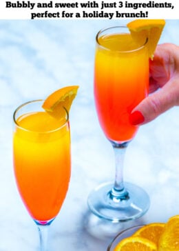 Pinterest pin with a hand holding a prosecco mimosa behind a second mimosa and a small bowl of orange slices.