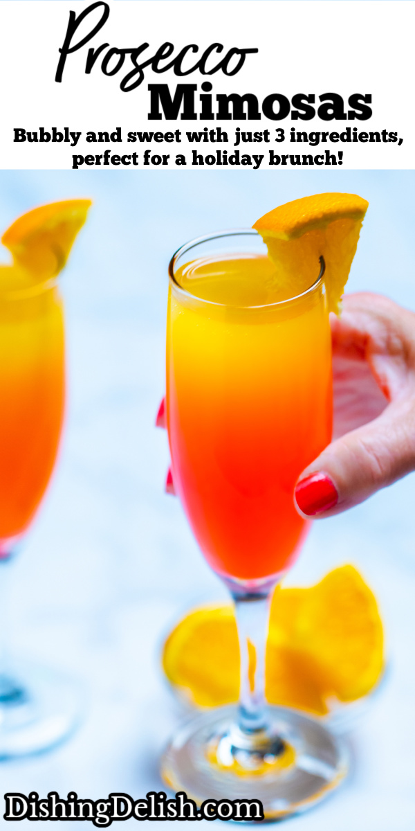 Pinterest pin with a hand holding a prosecco mimosa in front of a small bowl of orange slices.