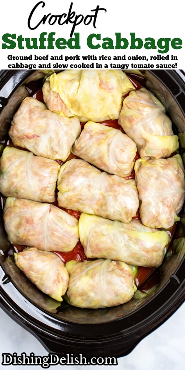 Pinterest pin with cabbage rolls layered on top of tomato sauce in a slow cooker.