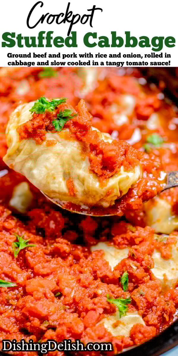 Pinterest pin with a spoon lifting a cabbage roll from the slow cooker topped with tomato sauce and fresh parsley.
