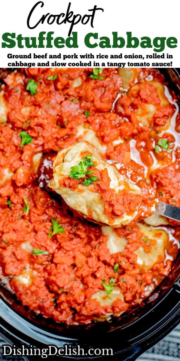 Pinterest pin with a spoon lifting a cabbage roll out of the slow cooker topped with tomato sauce and fresh parsley.