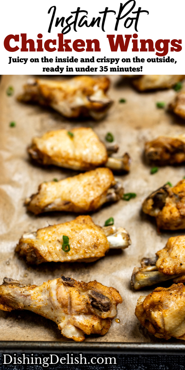 Pinterest pin with instant pot chicken wings on a sheet pan lined with parchment paper topped with green onions.