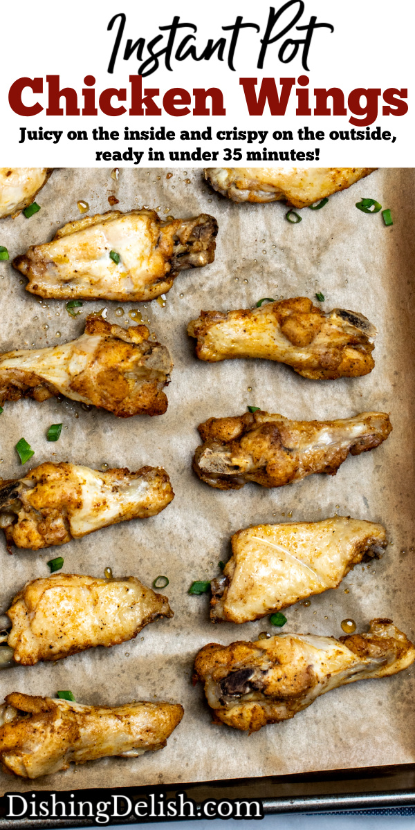 Pinterest pin with instant pot chicken wings on a sheet pan lined with parchment paper topped with green onions.