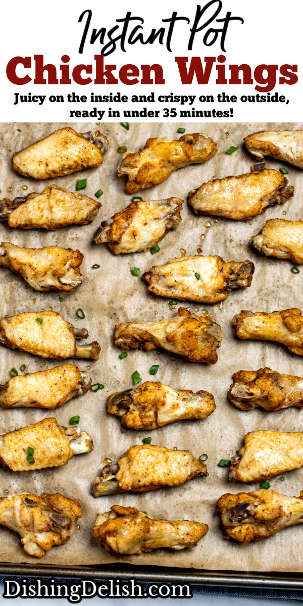 Pinterest pin with instant pot chicken wings on a sheet pan lined with parchment paper topped with green onions.