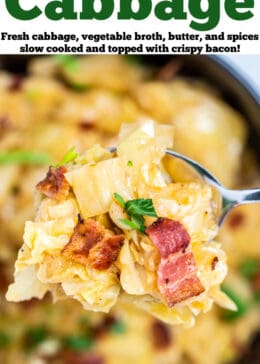 Pinterest pin with a closeup of a spoon scooping crockpot cabbage from a bowl topped with crispy bacon and parsley.