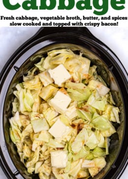 Pinterest pin with a crockpot full of raw cabbage topped with butter before cooking.