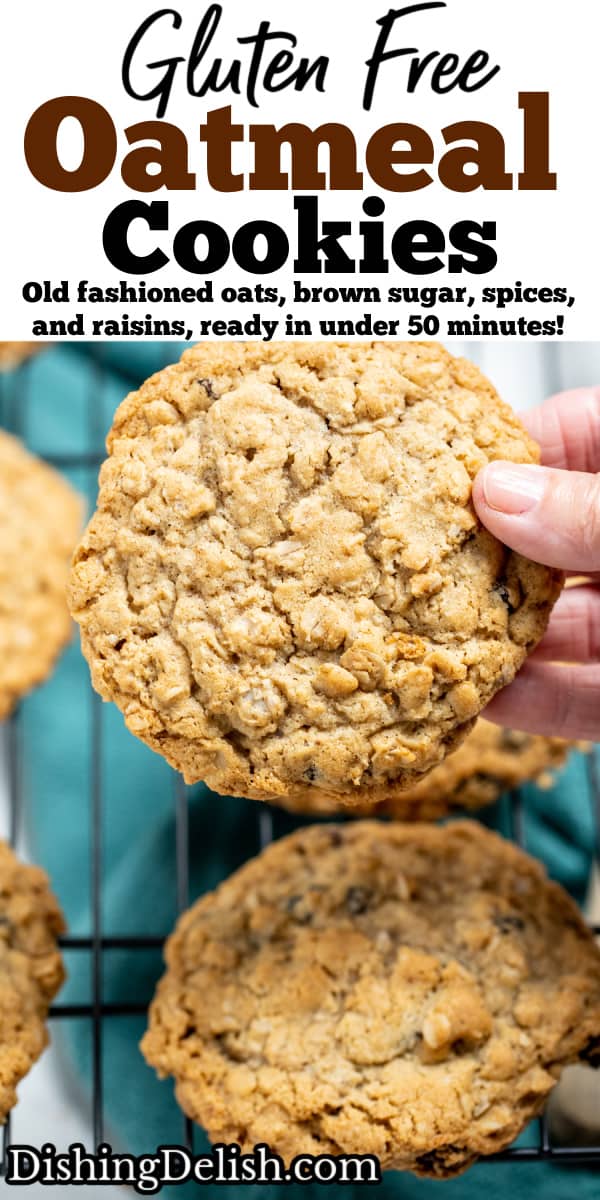 A pinterest pin with a hand holding a gluten free oatmeal cookie above a cooling rack of cookies.