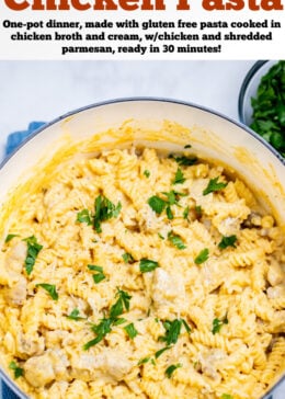 Pinterest pin with a dutch oven resting on a kitchen towel on the table, full of garlic parmesan chicken pasta topped with fresh parsley.