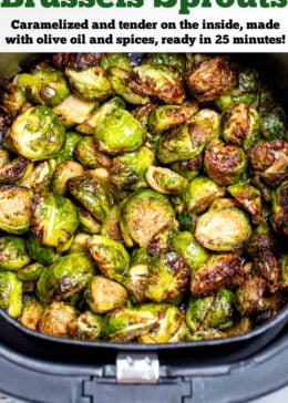 Pinterest pin with an air fryer basket full of fully cooked Brussels sprouts.