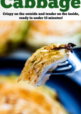 Pinterest pin with a fork holding a piece of cabbage over a plate with a cooked cabbage steak.