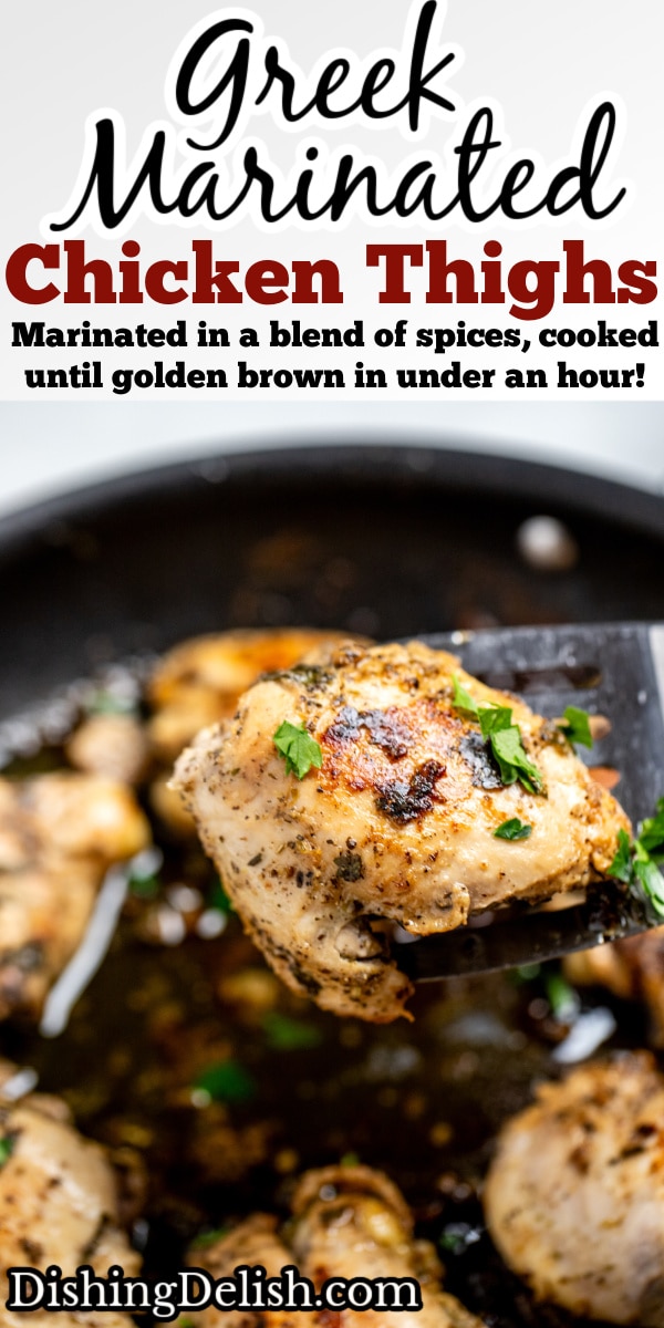 Pinterest pin with Greek marinated chicken thighs in a skillet topped with fresh parsley, with a spatula lifting a piece of chicken up.