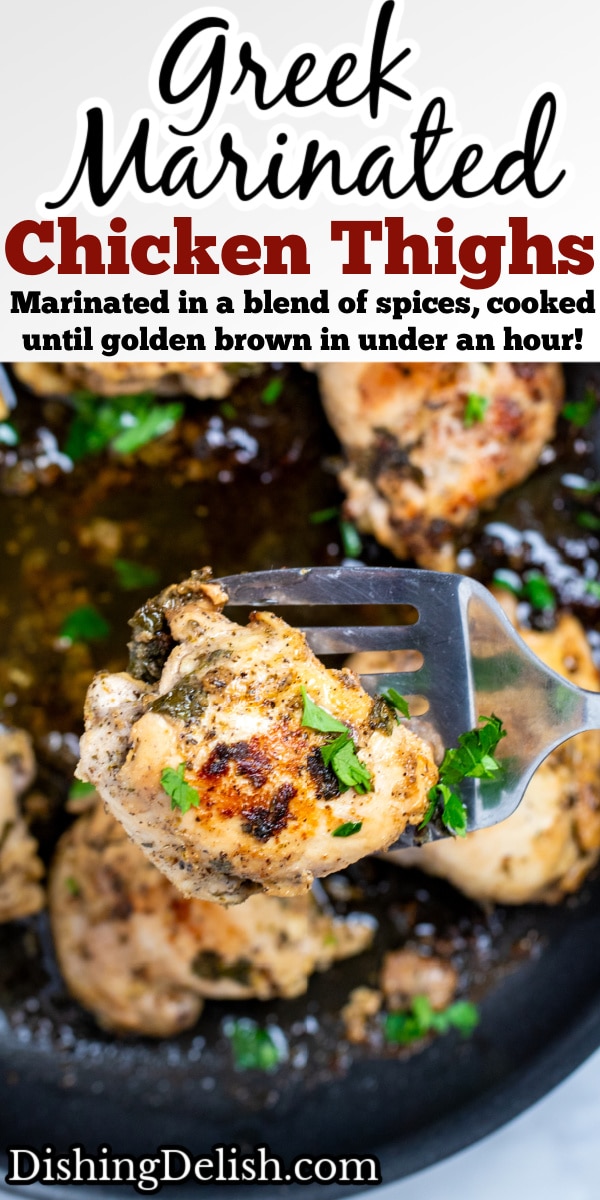 Pinterest pin with Greek marinated chicken thighs in a skillet topped with fresh parsley, with a spatula lifting a piece of chicken up.