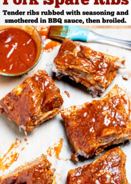 Pinterest pin with Instant Pot Pork Ribs cut into sections sitting on top of parchment paper on a cutting board, next to a brush and a bowl of bbq sauce.