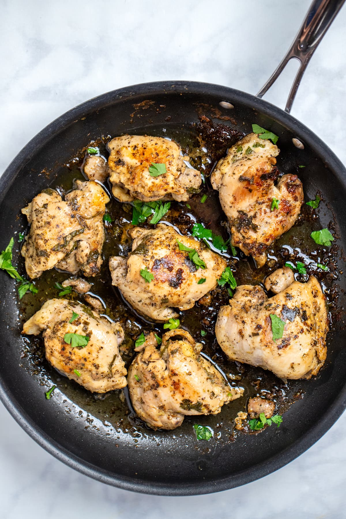 Greek Marinated Chicken Thighs • Dishing Delish