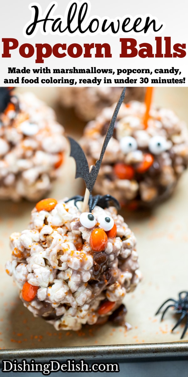 Pinterest pin with a Halloween popcorn ball on a sheet pan surrounded by orange sprinkles and spiders.