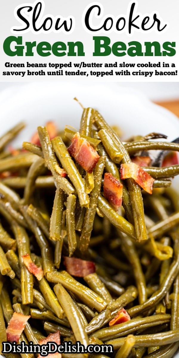 Pinterest pin with a bowl of crockpot green beans on a table, with a spoon lifting up a scoop of green beans topped with bacon.